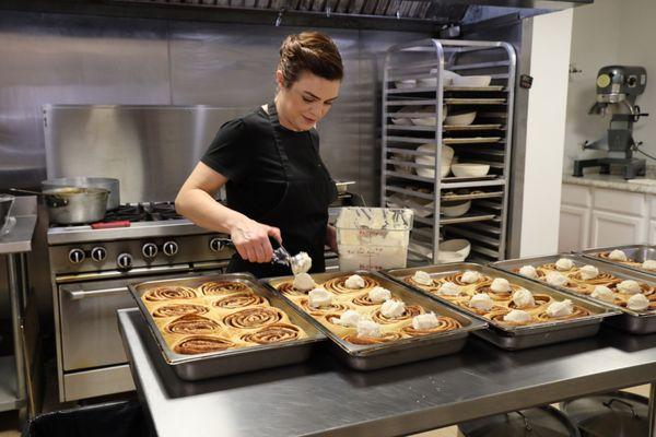 Chef/Owner Helen preparing our delicious cinnamon buns.