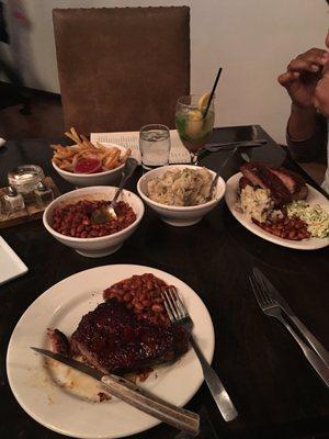 Pork chops, BBQ baked beans mashed potatoes rib tips, fries and asparagus! All delicious. The beans were particularly my favorite.