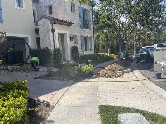 Process of replacing a water main pipe from the meter to the house.