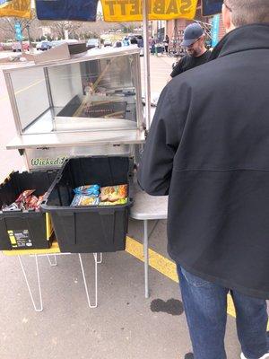 In front of Lowes hardware - hot dog cart