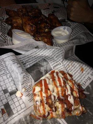 Buffalo Chicken Flat Bread w/ BBQ Chicken Wings in the background