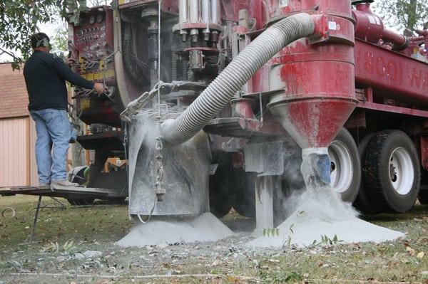 200' deep hole being drilled for a geothermal installation