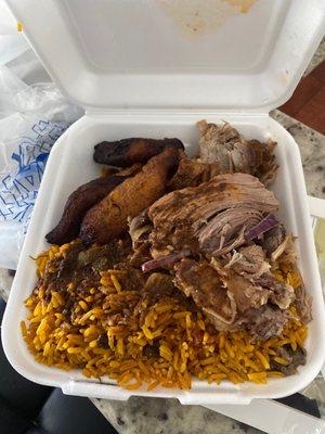 Yellow rice and peas, pork , plantains , and oxtail gravy