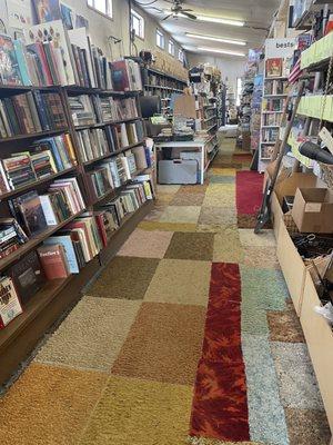 Look at the amazing selection of books and that fabulous carpet