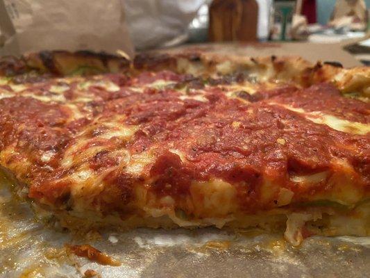 Sausage, onion, green pepper deep dish pizza.