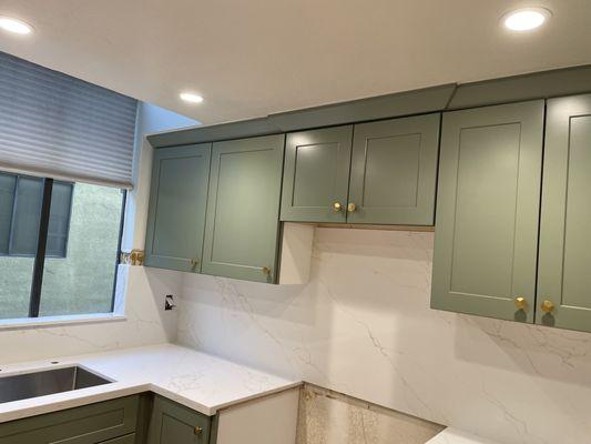 Green shaker kitchen cabinets