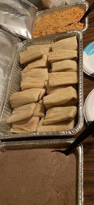 Bottom: beans Middle: chicken tamales Top: rice