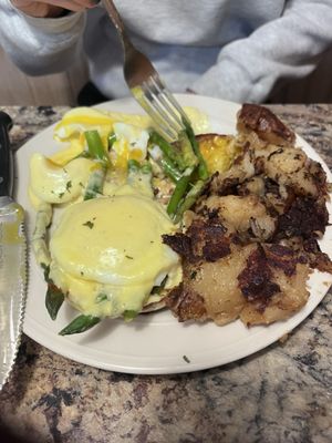 Daughter's asparagus Benedict with the most delicious home fries I've ever tasted and the Hollandaise sauce was spot-on!