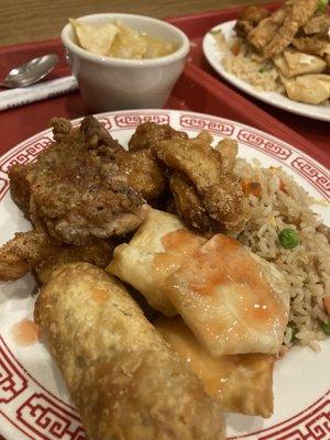 Fried chicken, sesame chicken, egg roll, crab puff, and fried rice (egg drop soup in the back!)