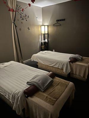 Couples massage room, very serene and dimly lighted