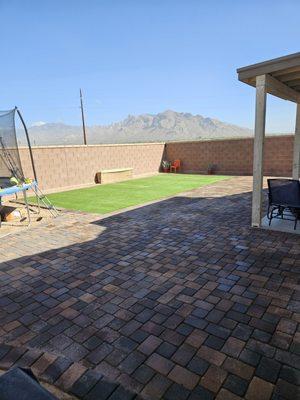 Artificial turf and pavers installation done.