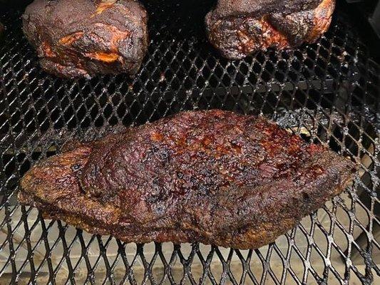 Brisket!  Around here, this is king!  Our brisket is given a perfect combination of seasoning and then slow smoked for 14 to 16 hours.