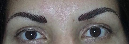 Newly done permanent eyebrows. Color will soften in about one week.