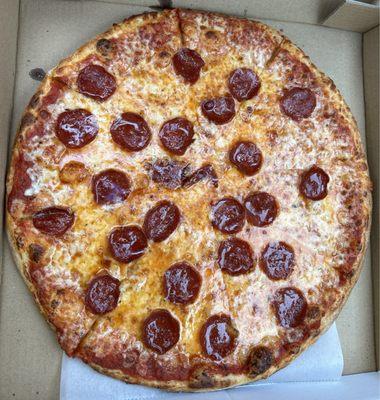 Beef Pepperoni Pizza - greasy, simple with a tangy sauce and stringy cheese. They have a conveyor oven. Ask for well done.