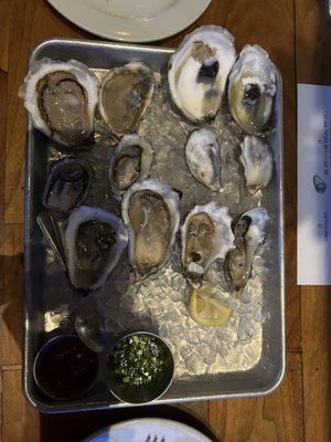 A dozen delicious oysters, sadly sideways and partially eaten, and in a bit of a shadow, but were so good!