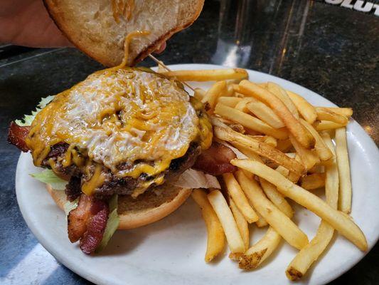 Bacon Cheeseburger with fries (opened up so u can see the inside. Bf loved it. Big sized juicy patty