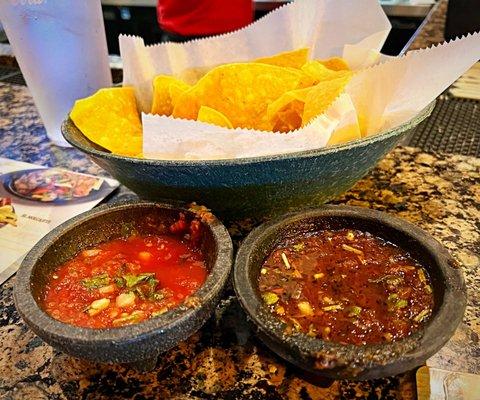 They serve two salsas: left is cold and traditional and the right is served warm with a smoky taste. Excellent and different.