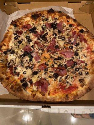 Soggy center pizza with cheap, black olives instead of the kalamata olives advertised, again!!!