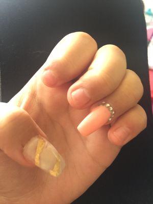 Those are the three nails that popped off because they put the acrylic on my skin instead of just on my cuticle