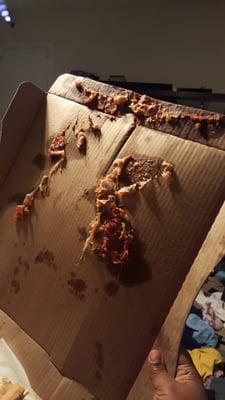 Cheese stuck to the crushed pizza box...worse delivery ever...