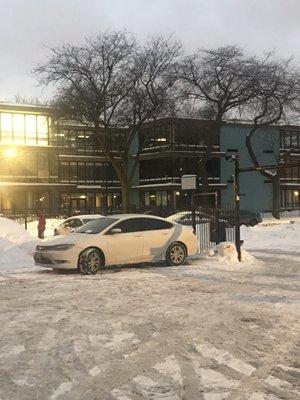 Renter parked crazy in the parking lot.