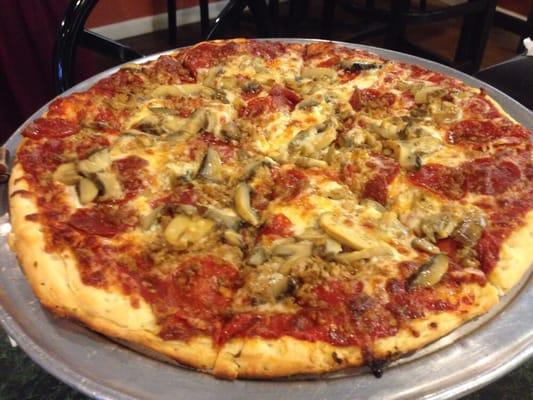 Pepperoni, sausage, mushroom large hand tossed pizza