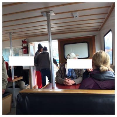 Homer, Alaska - Rainbow Tour Halibut Charter. The inside of the boat named "Jackpot". Blocked out faces of people I didn't know.