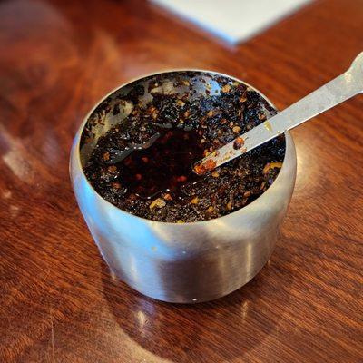 Jar of sa tế on the table