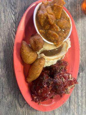 Meatloaf special with yams and mashed potatoes