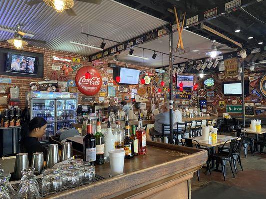 The inside of the restaurant. Used to be a gas station. Inside and outside seating. We loved being outside as we had our doggie with us.