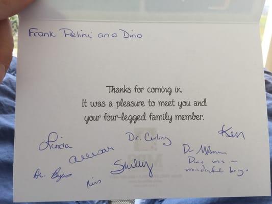 A handwritten card signed by every member of the team from the Grand Animal Hospital.