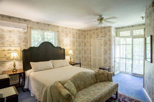 Romance in Lenox room with king bed and fireplace.