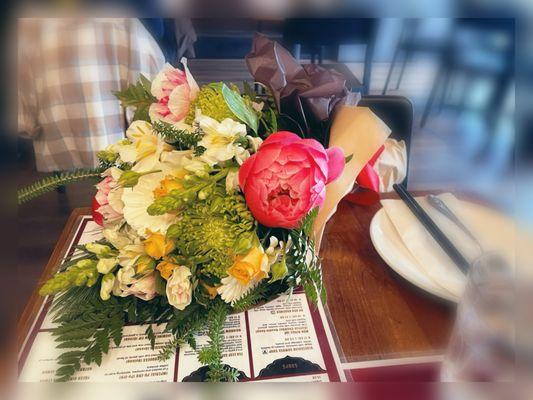 Beautiful bouquet for my friend's birthday! I asked the florist for a festive red ribbon!