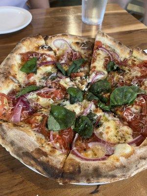 Heirloom tomatoes and blue cheese seasonal pizza