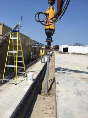 Avalon installs 5 1/2 inch helical piles deep into the earth to support commercial structures.