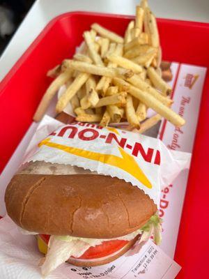 Veggie burger with raw onions and chili peppers