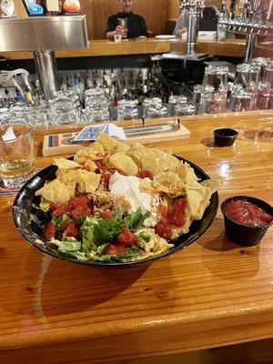 Kickin' Chicken Taco Salad - Very good. It had chicken, beans, olives, jalapeños, sour cream, chips and salsa