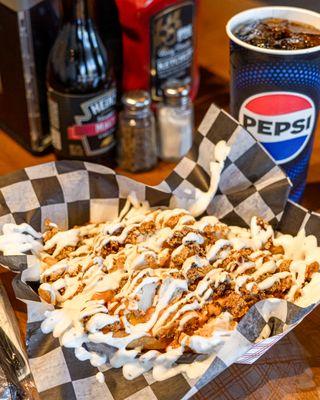 Loaded Fries (new york style breaded chicken with garlic sauce, hot sauce and cheese)