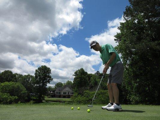 One of two practice putting greens at Towne Lake. This is the one next to the driving range. It's also used for chipping.