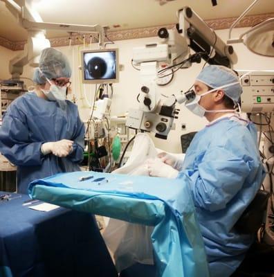 Dr. Leach and staff hard at work getting ready to install my Visian ICL Lenses.  My eye is displayed on the monitor on the left.