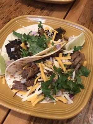 Brisket and pork tacos! Surprisingly good!!