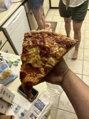 Massive slice of delicious pizza