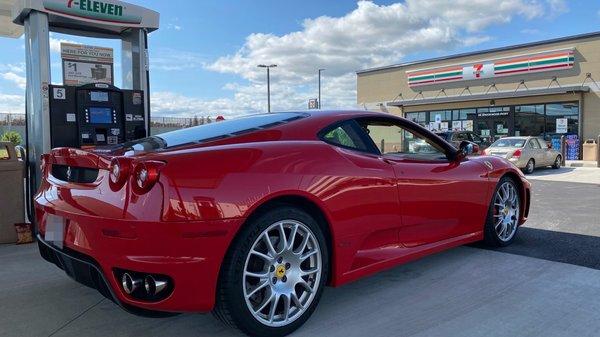 Ferrari fueling up at pump no.5