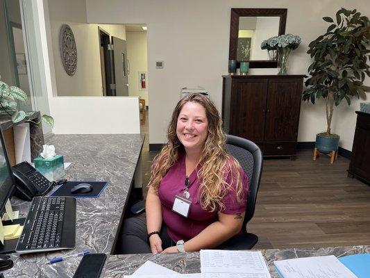 Cheyenne manning (or woman-ing) the front desk at our S Lime St office. Always ready with a smile!