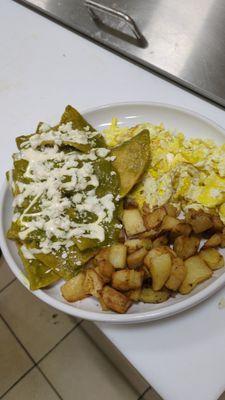 Green sauce Chilaquiles, eggs and country potatoes.