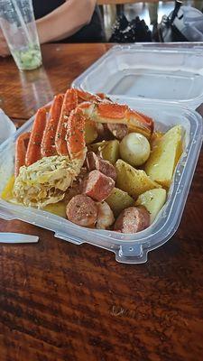 Delishous crab plate with hard boiled egg.