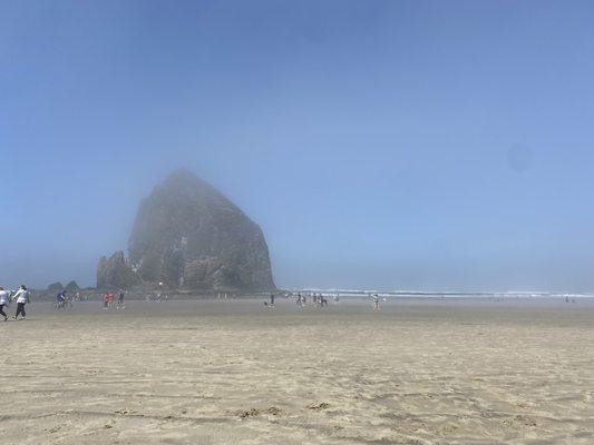 Beautiful fog rolling in haystack rock