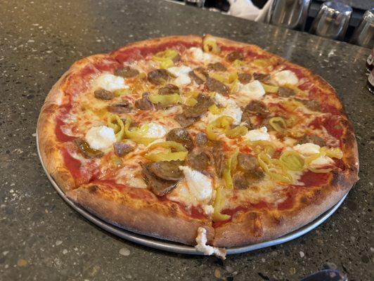 PI Con Saliccia- with a Sweet Red Sauce, Spicy Italian Sausage, Creamy Ricotta and Mozzarella Cheese.