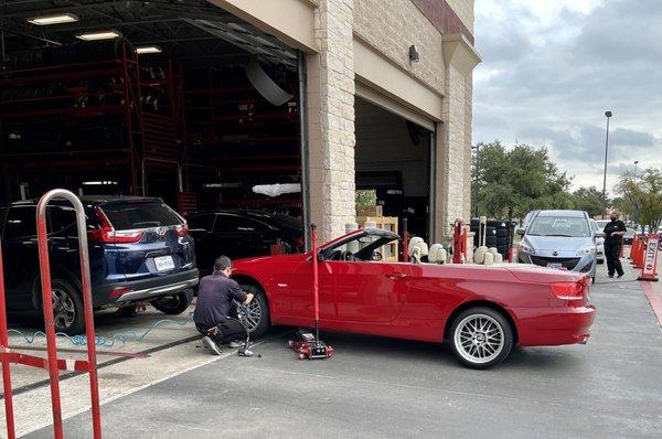 My convertible getting a screw removed from the tire. THANK YOU!