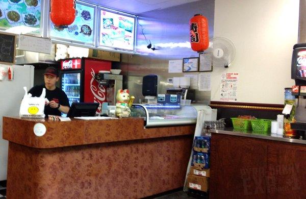 Typical Chinese restaurant layout upon entering- except it's Japanese. A few small tables and chairs